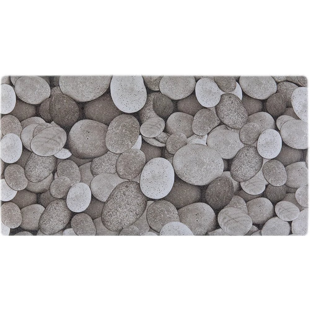 rectangular grey bath mat with a photographic design featuring an assortment of grey pebbles