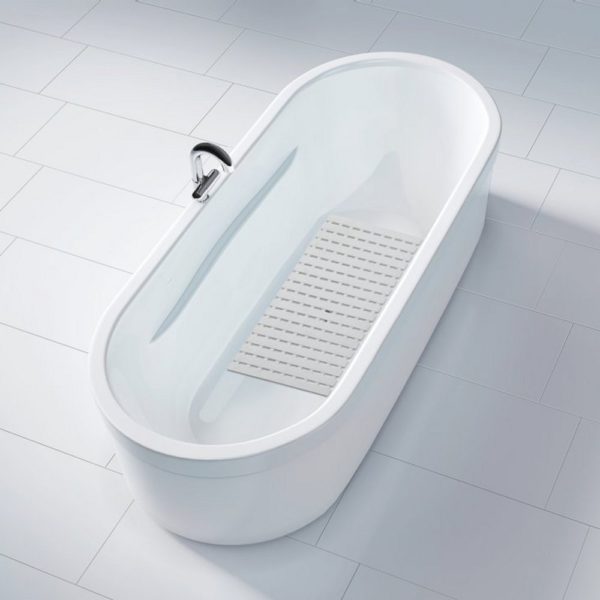 White plastic, rectangular bath mat in a slatted design centred in a white bathtub