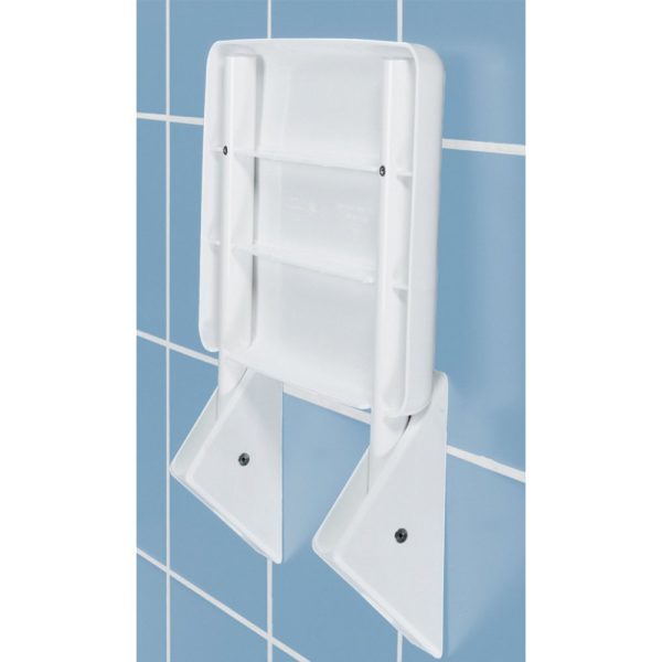 white rectangular shower seat on a blue tiled wall. it is folded in the up position