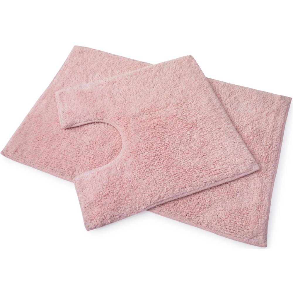set of 2 blush pink bath mats laid on top of each other, the bottom one is larger and rectangular whilst the one on top is square with a d shaped section cut out of one side to allow for toilet