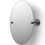 round mirror with chrome wall brackets. On the wall brackets are white circles with the text "Croydex est 1919"