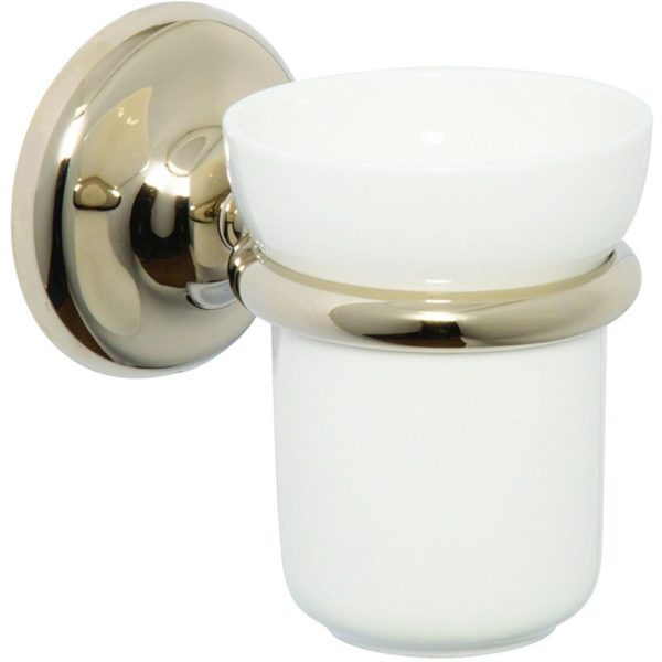 white ceramic tumbler in a gold coloured wall mounted holder with round, bevelled-edge wa
