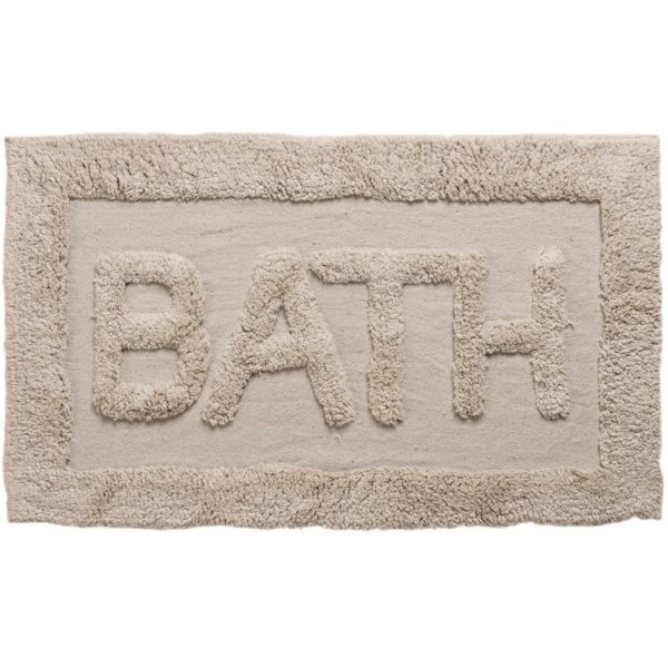 rectangular beige bath mat with a textured border and textrued text in the centre reading 'bath'