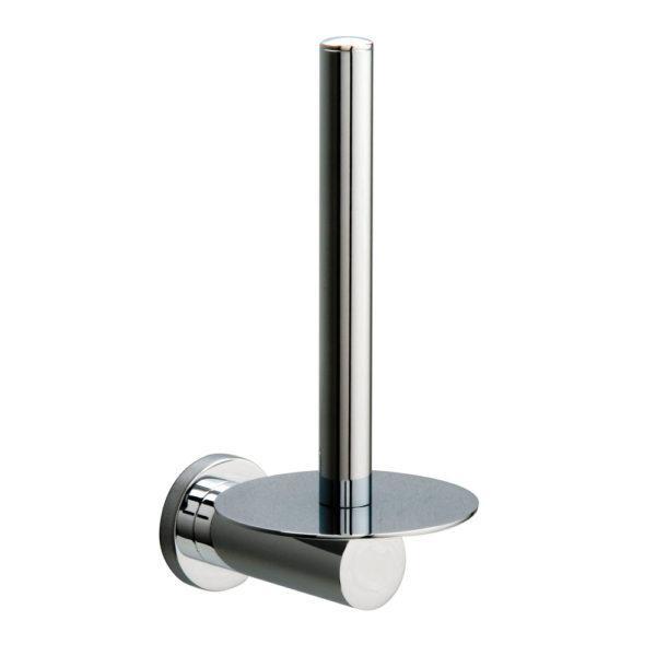 chrome upright, wall mounted spare toilet roll holder with round disk at base. the wall mount is circular in shape.