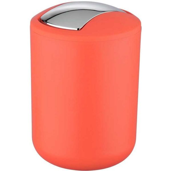 coral coloured rounded plastic swing lidded bin with rounded top and a chrome, curved rectangular swing lid
