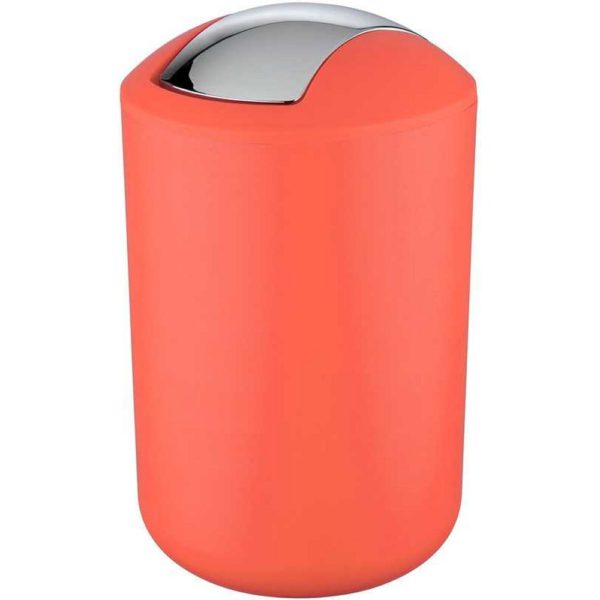 coral coloured rounded plastic swing lidded bin with rounded top and a chrome, curved rectangular swing lid