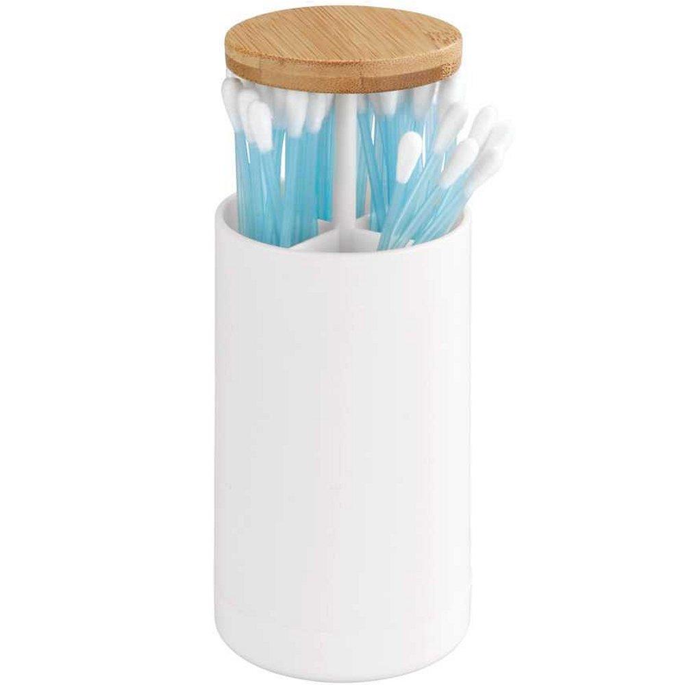 white ceramic cylindrical cotton bud storage with pop up bamboo lid. The lid is shown in the up position, showing the cotton buds being stored within