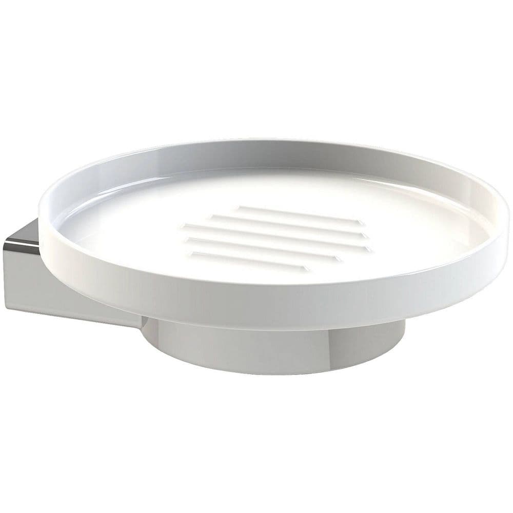 white round ceramic soap dish with lip around the edge and raised parallel lines in the centre