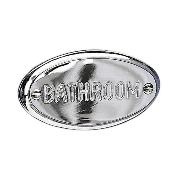 chrome oval sign with the word 'BATHROOM' engraved on it in upper case in a sans-serif font.