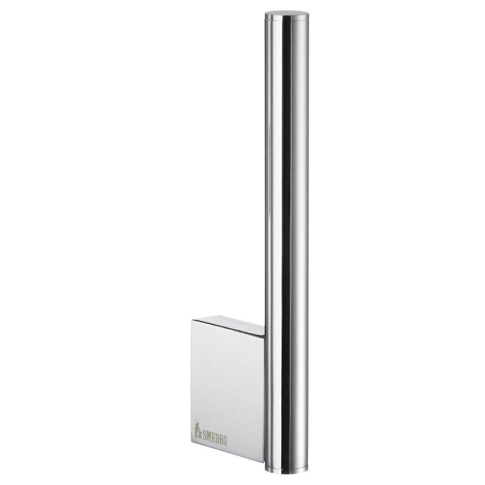 chrome wall mounted spare roll holder, it is a short vertical post attached to the wall via an blocky rectangular wall mount