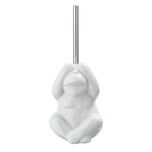 white ceramic monkey shaped toilet roll holder with long, straight chrome coloured brush handle sticking out from the top of its head. the monkety is posed like the 'see no evil' part of the three wise monkeys.