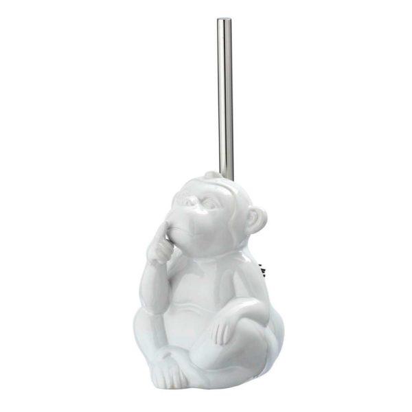 white ceramic monkey shaped toilet roll holder with long, straight chrome coloured brush handle sticking out from the top of its head. the monkety is posed like the 'speak no evil' part of the three wise monkeys.