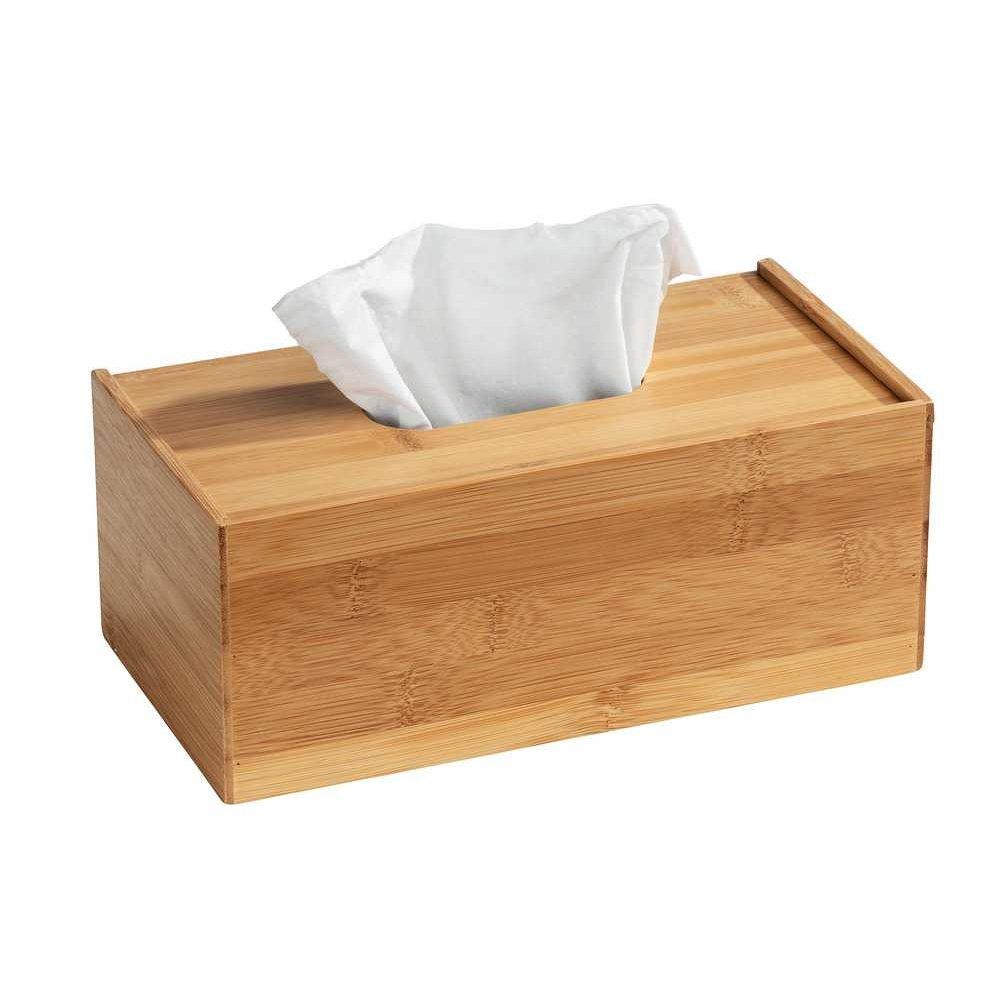 rectangular bamboo tissue box with a white piece of tissue paper poking from a hole in the top